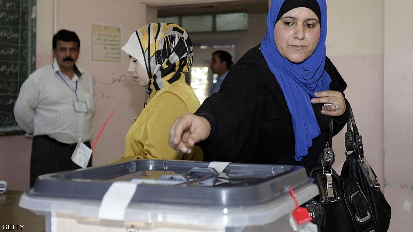 A Jordanian woman casts her ballot for municipal elections at a polling station in Amman on August 27, 2013. The Muslim Brotherhood, the main opposition party, is boycotting the polls, charging that, despite repeated promises since the Arab Spring of 2011, there is no real readiness for change.  AFP PHOTO/KHALIL MAZRAAWI        (Photo credit should read KHALIL MAZRAAWI/AFP/Getty Images)