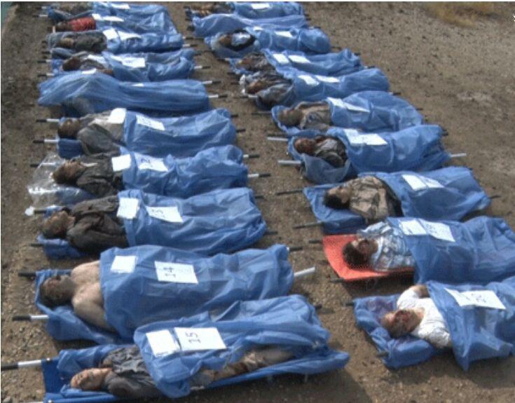 مجموعة من ضحايا الهجوم الصاروخي على مخيم ليبرتي